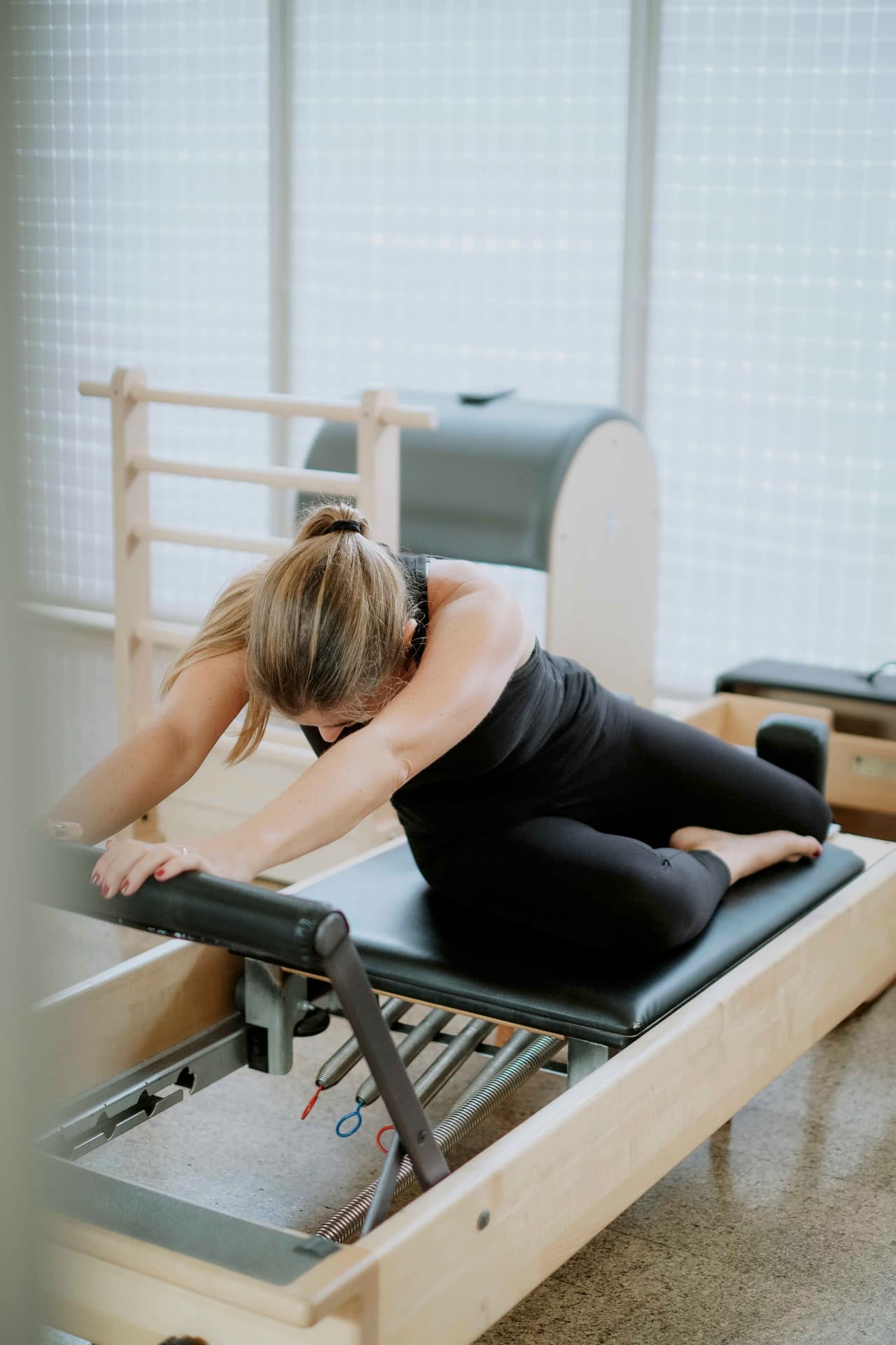 Sessão no Universal Reformer, alongamento